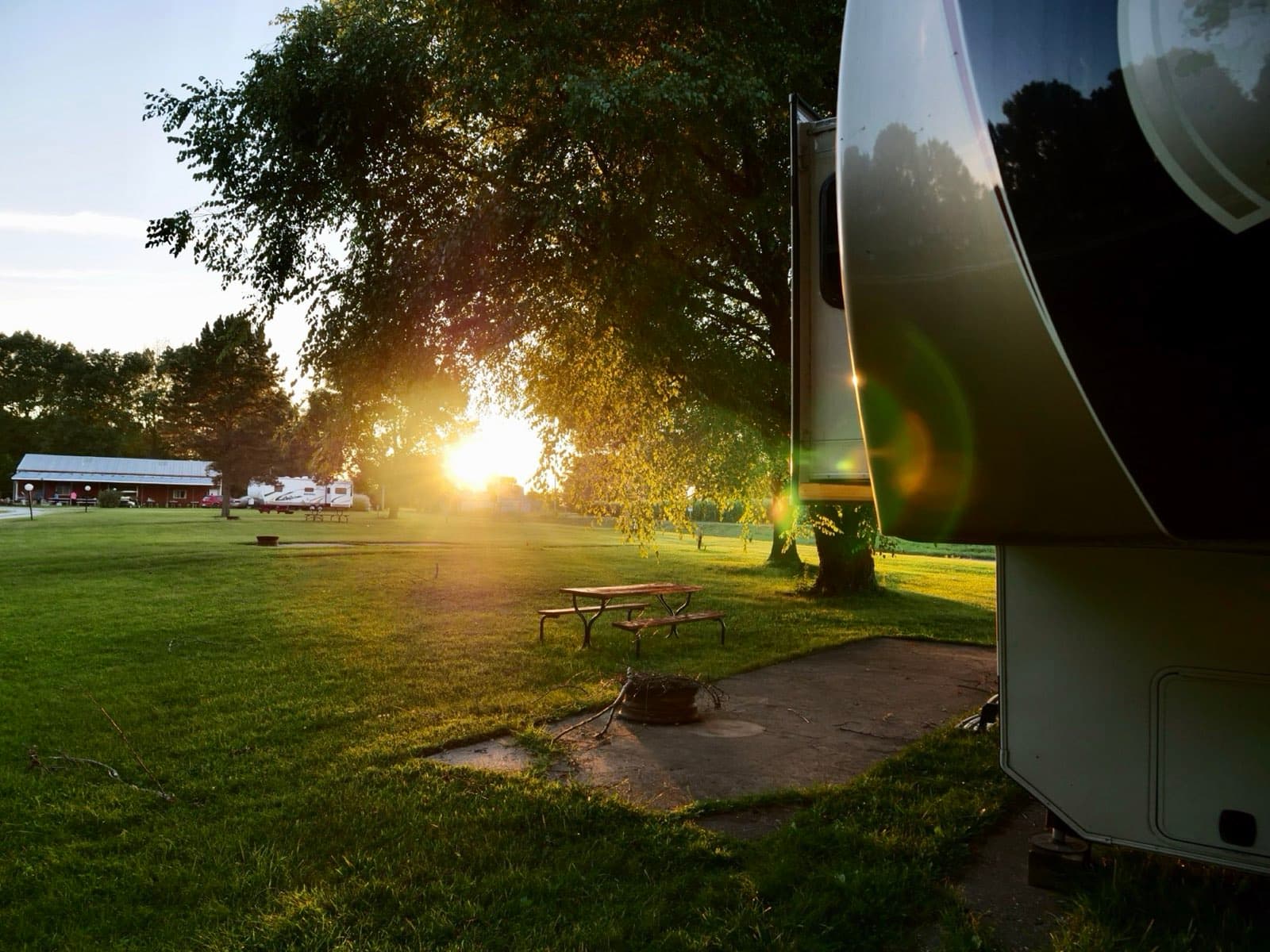 A camper at sunset