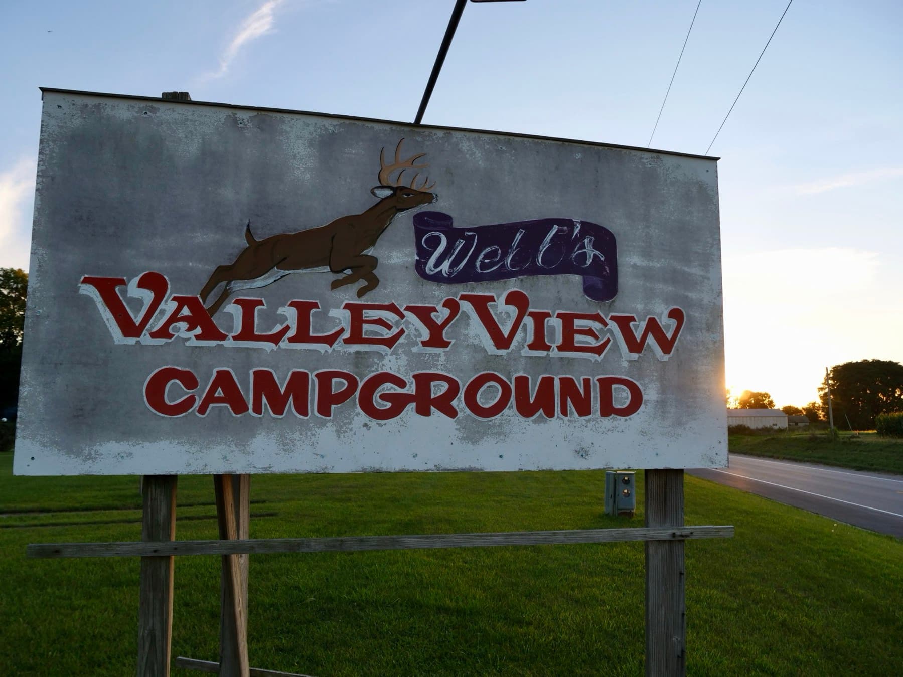 Background image showing campground scenery