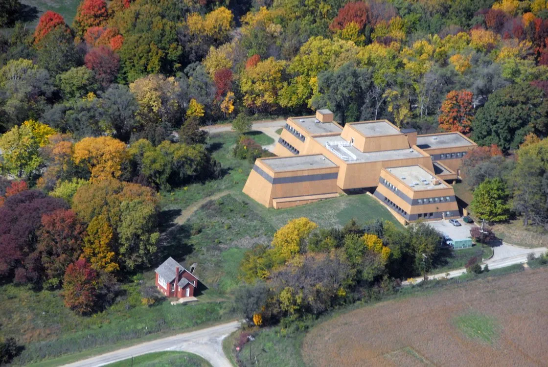 An arial photo of Dickson Mounds Museum surrounded by fall trees